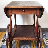 Folding dessert table in solid chestnut, 2 drawers, wheels, 20th century.