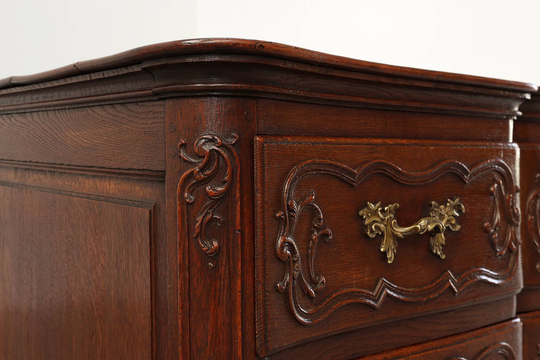 French 18th Century hand crafted oak chest of drawers in Louis XV style