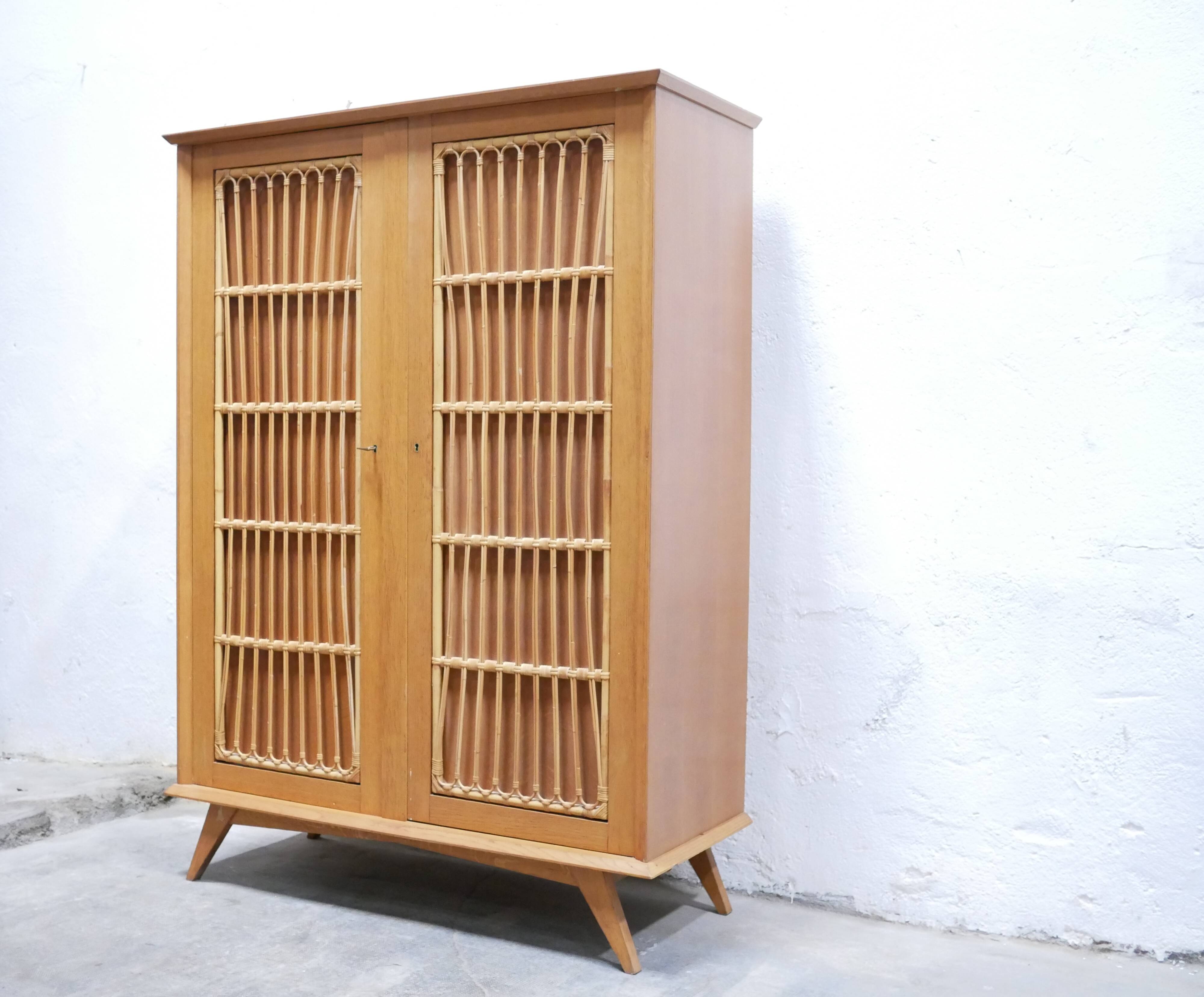 Vintage wardrobe in wood and rattan
