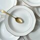 7 Winterling Marktleuthen Bavaria porcelain soup plates in white and gold