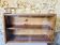 Vintage wall shelf with plexiglass sliding doors