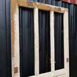 Ancient paneled solid oak door with 3 windows