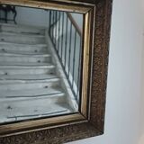 Antique wooden and gilded stucco mirror