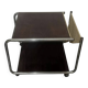 1970s/80s coffee table on casters with metal tubing, light-colored door