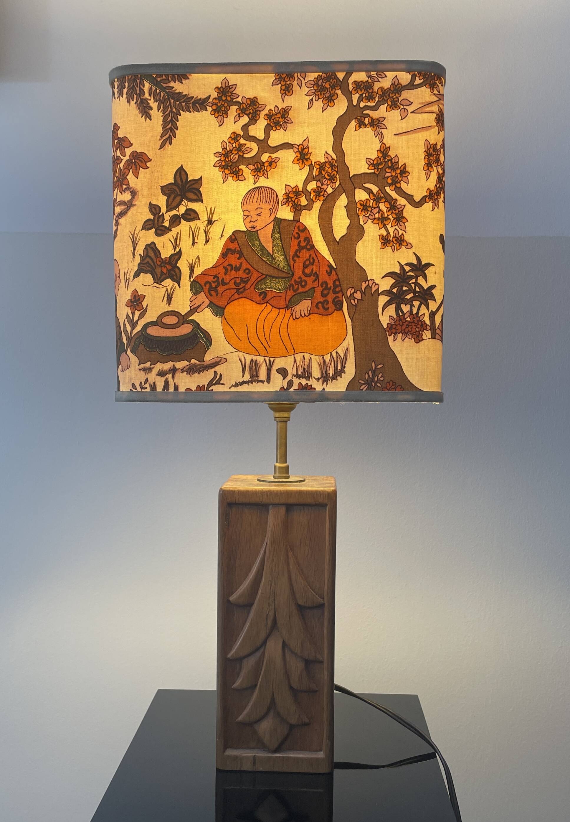 Wooden lamp with carved plant decoration from 1930-50, sold with a 1970 lampshade.