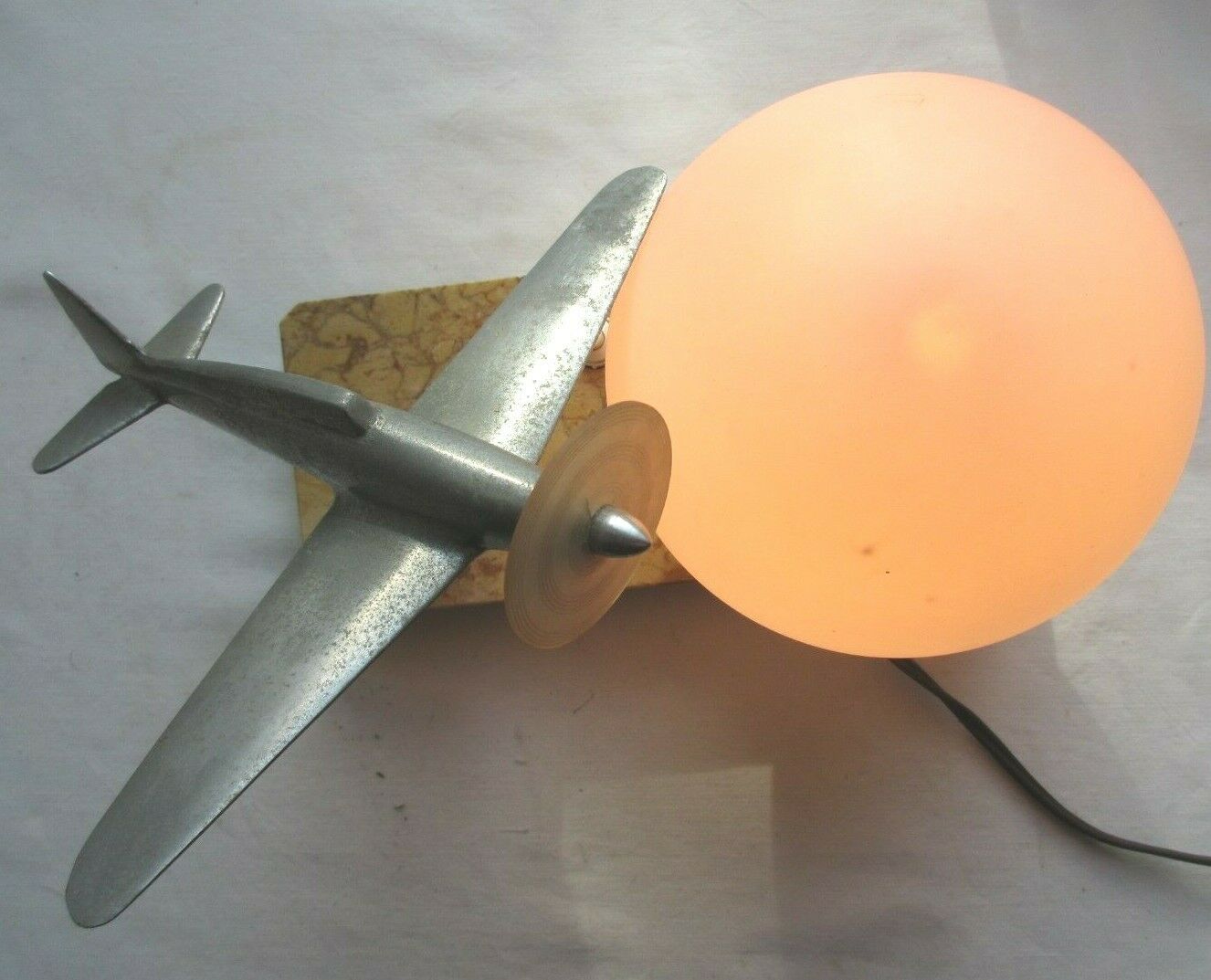 Art deco table lamp aluminum airplane and ball tulip on marble terrace