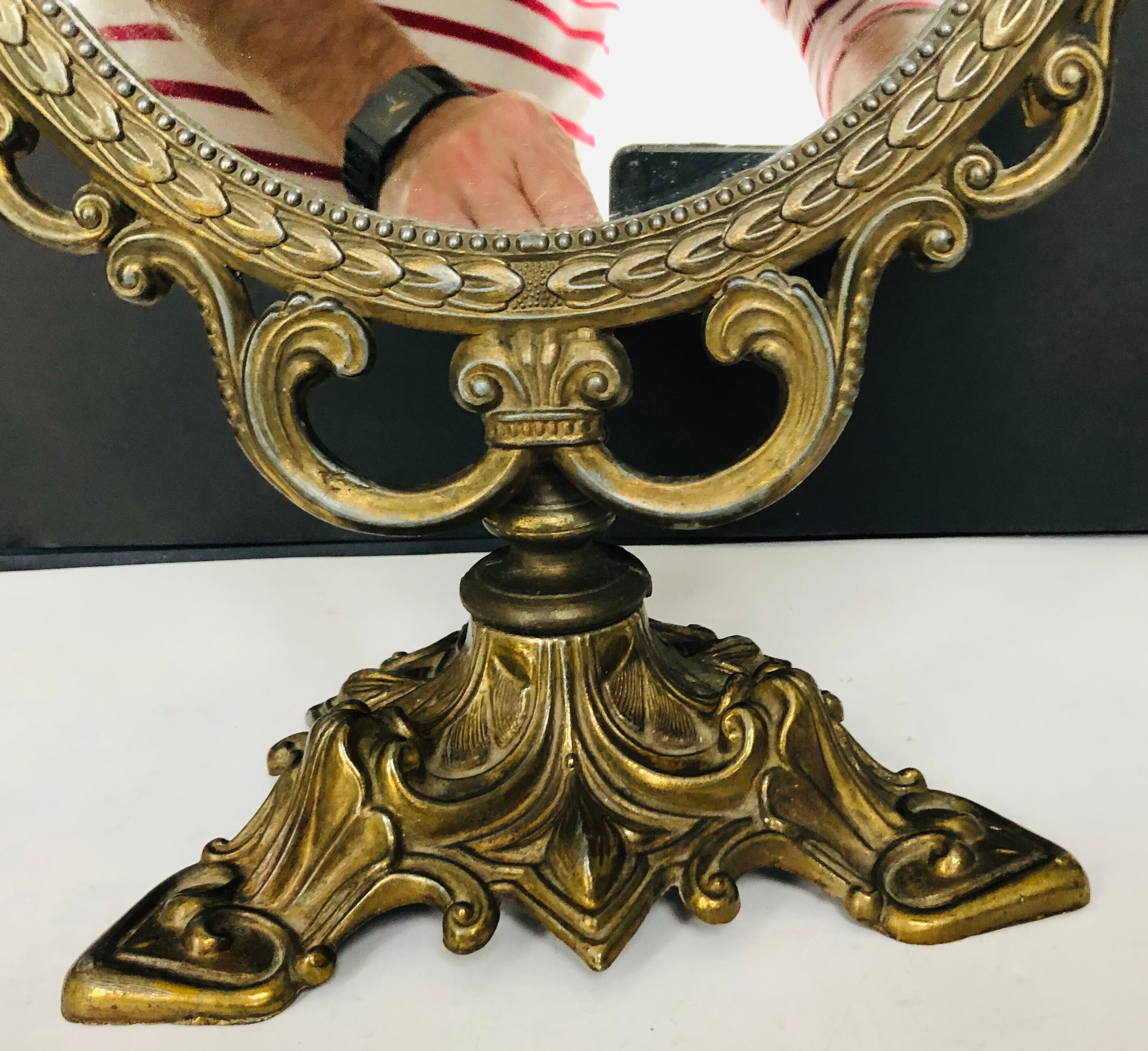 Antique table mirror in gilded bronze