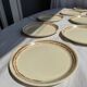 Lot de 11 assiettes en grès blanc liseré brun D24,5