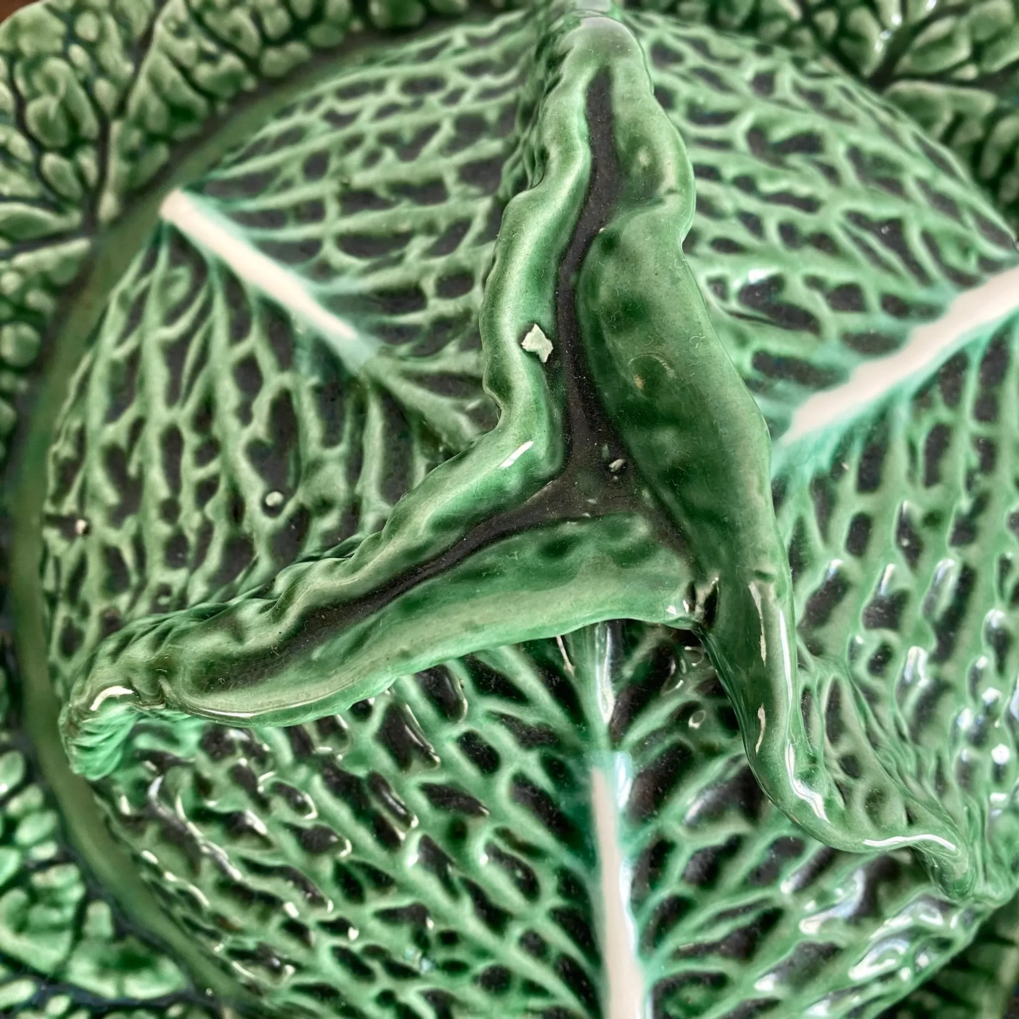 Large soup tureen in earthenware with a cabbage design, along with a dish and spoon.