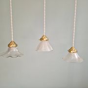 Trio of Art Deco grooved glass pendant lights, 1920s-30s