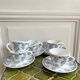 5 coffee cups with blue flower decor from the 70s