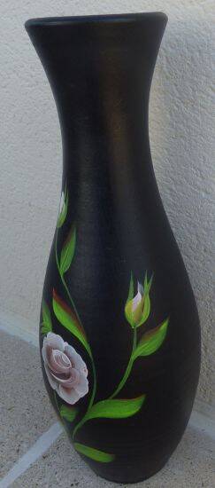 Very large black vase decorated with flowers, height 61.50 cm.