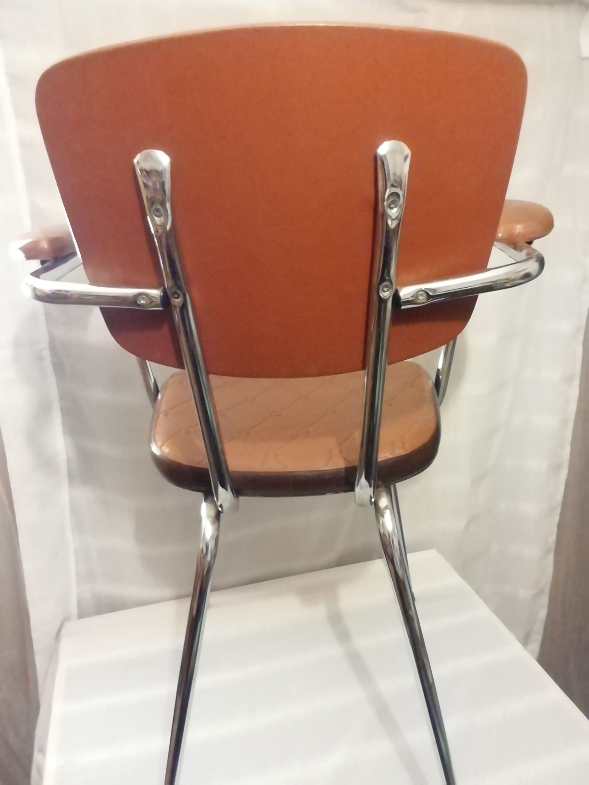 2 skaï chairs and vintage chrome