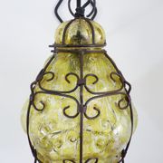 Italian vintage wall lamp in yellow blown glass and wrought iron. Year 70 80