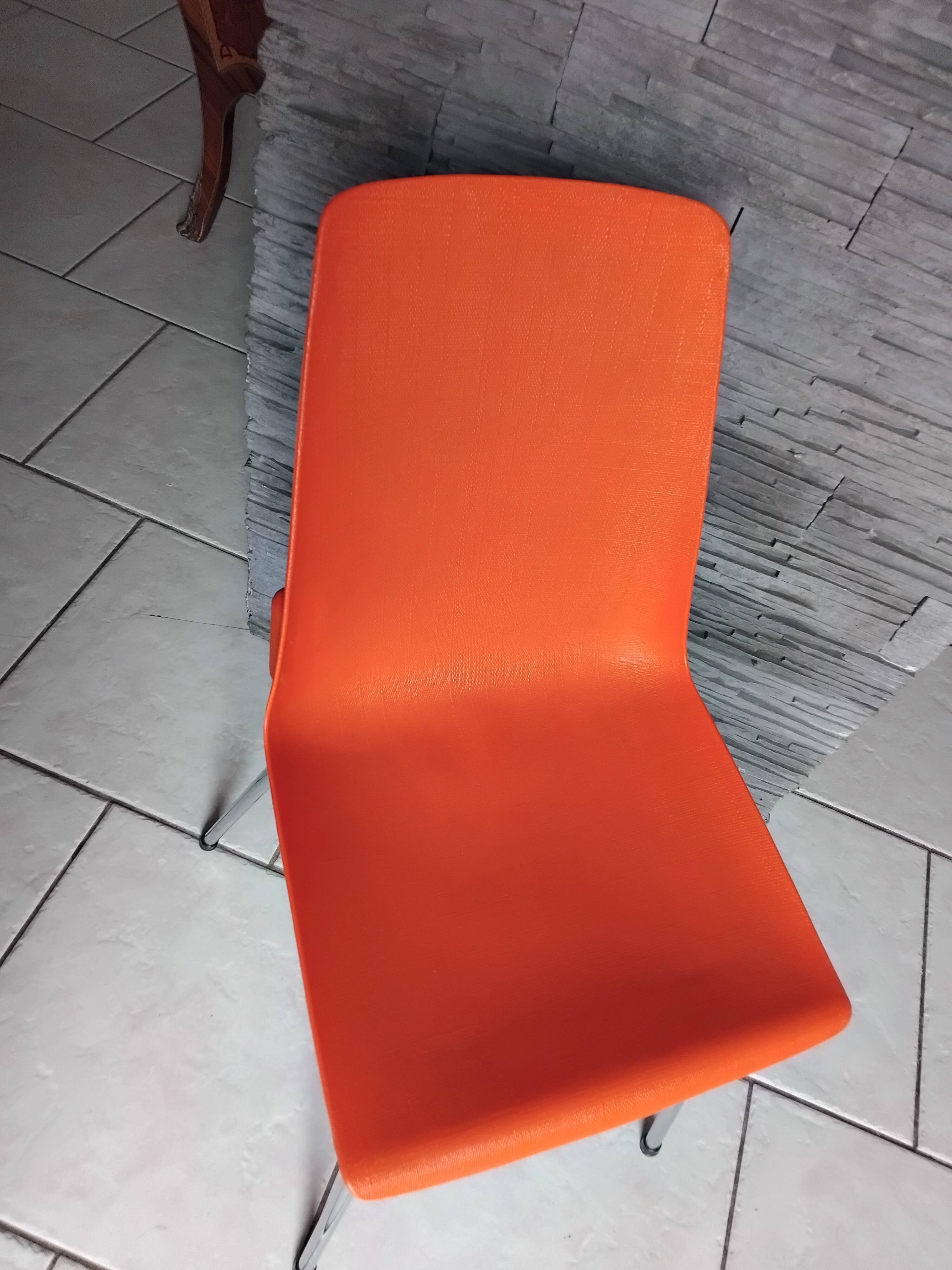 Chaise vintage grosfillex design rouge orangé
