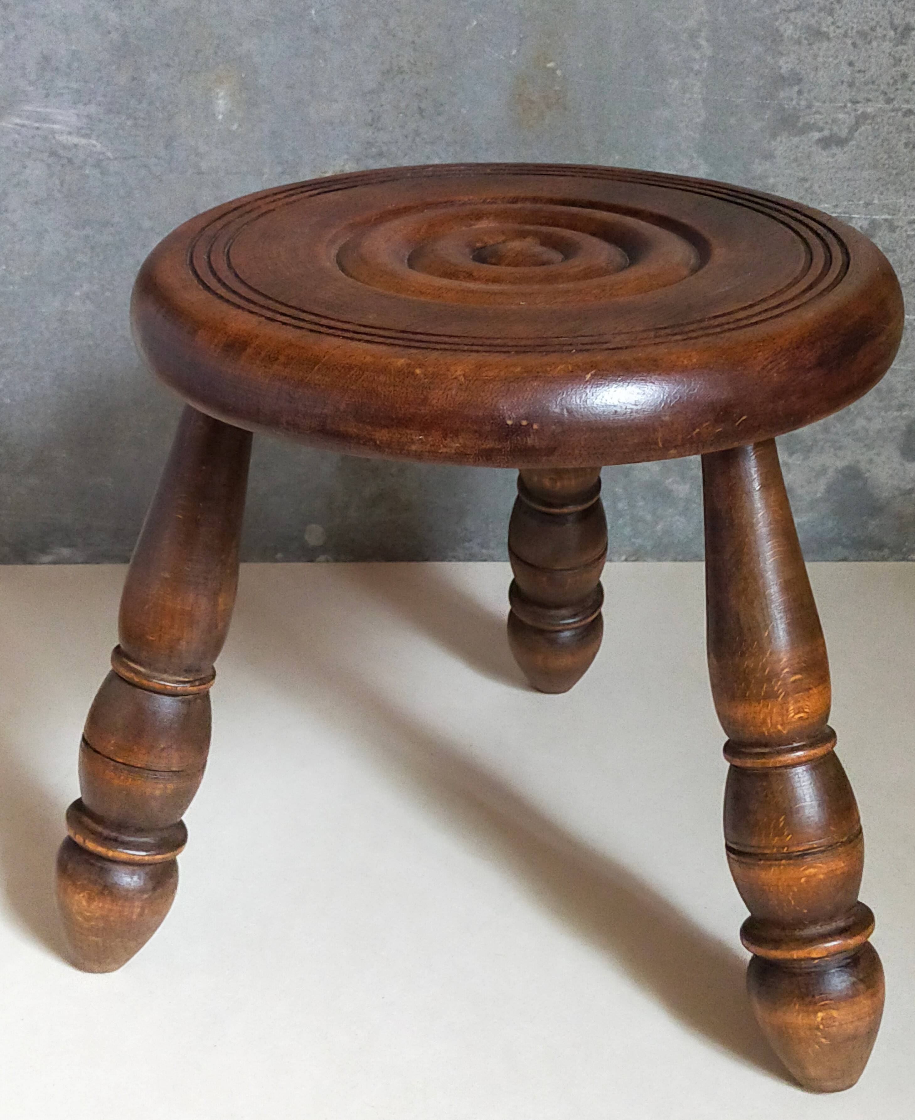 Low tripod stool in vintage turned solid wood