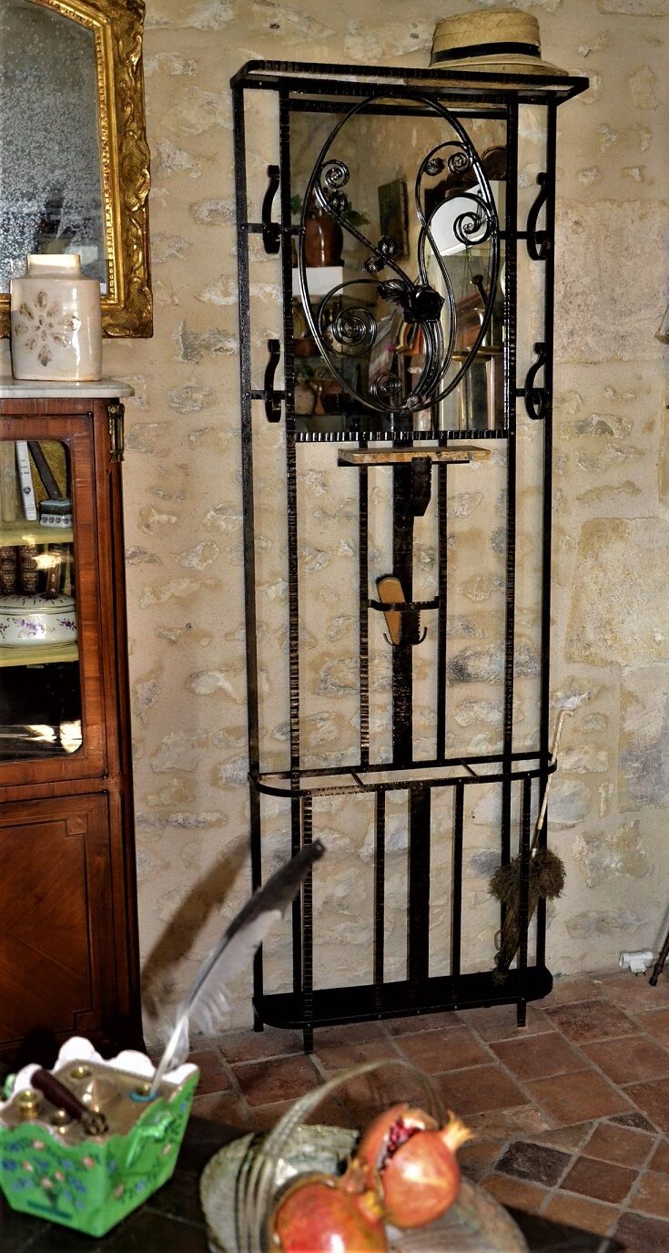 Wrought iron wardrobe with oval mirror