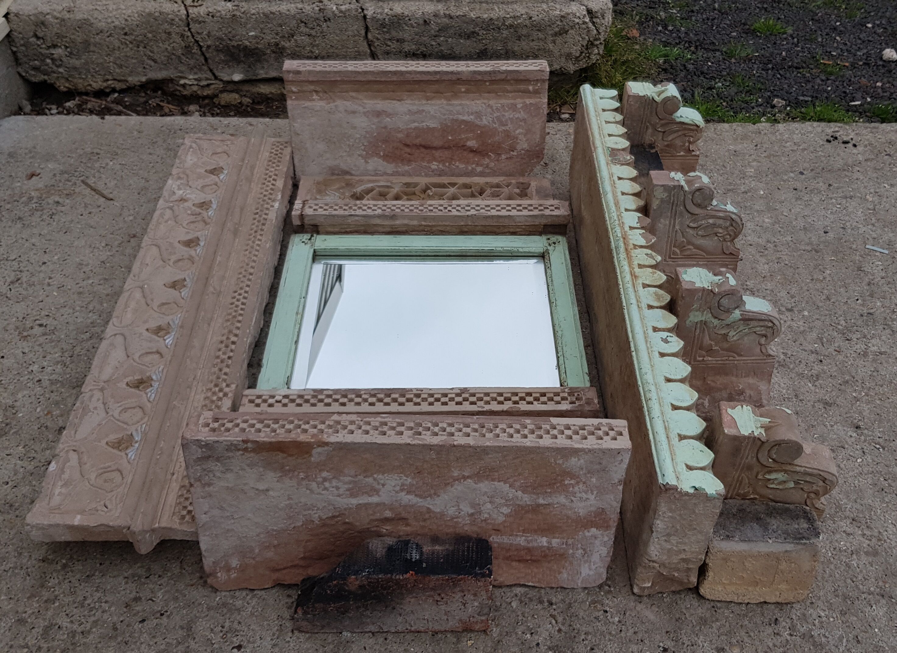 Fully hand-carved stone window with mirror