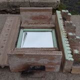 Fully hand-carved stone window with mirror