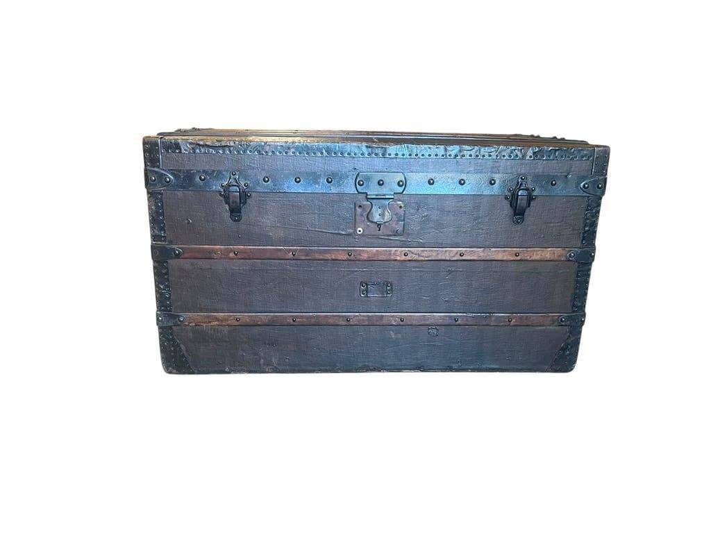 Vintage wooden coffee table with iron fittings.