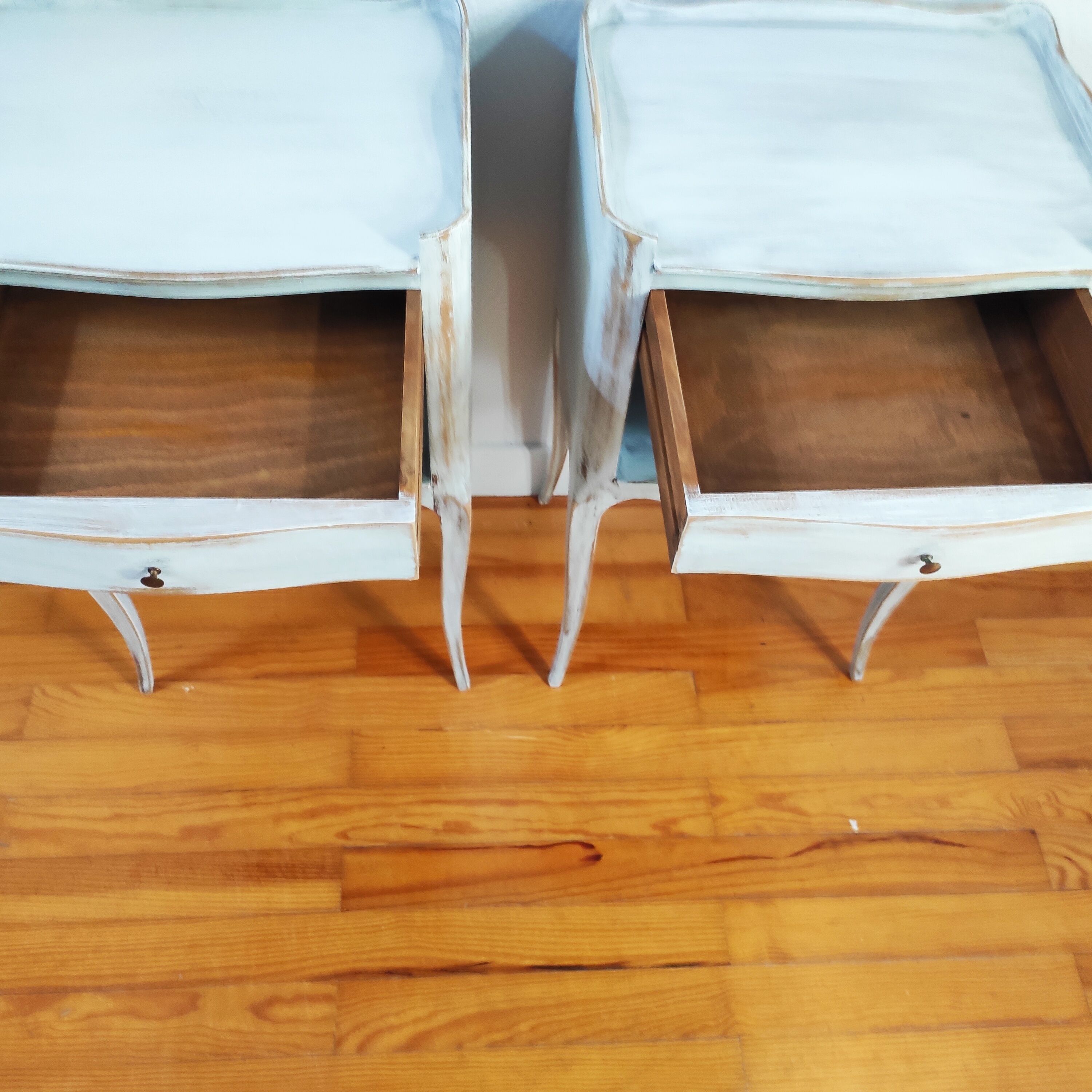 Pair of patinated bedside tables