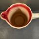 Antique pitcher in slipware with floral decoration – red and cream floral design