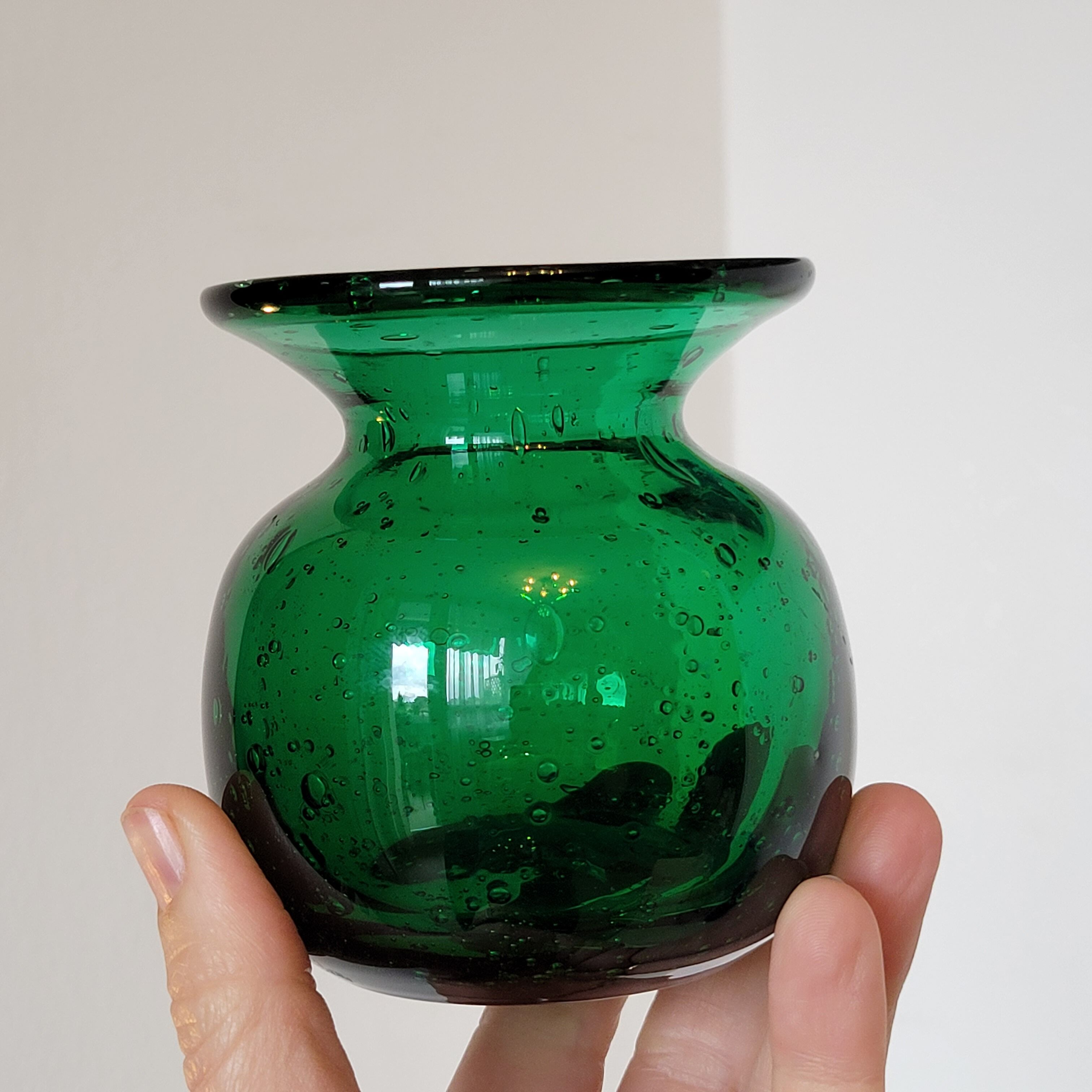 Small green bubbled blown glass vase