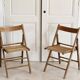 Pair of folding wooden chairs
