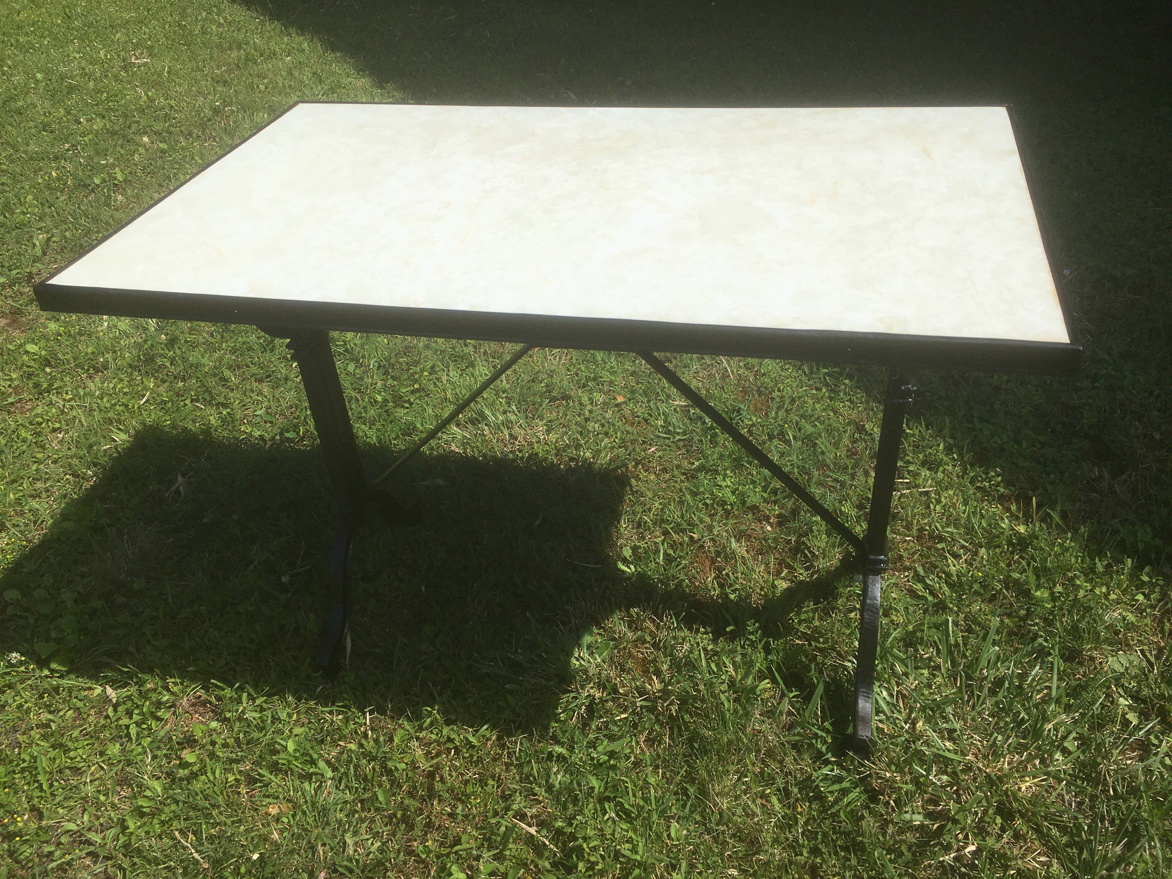 Bistro table with cast iron base