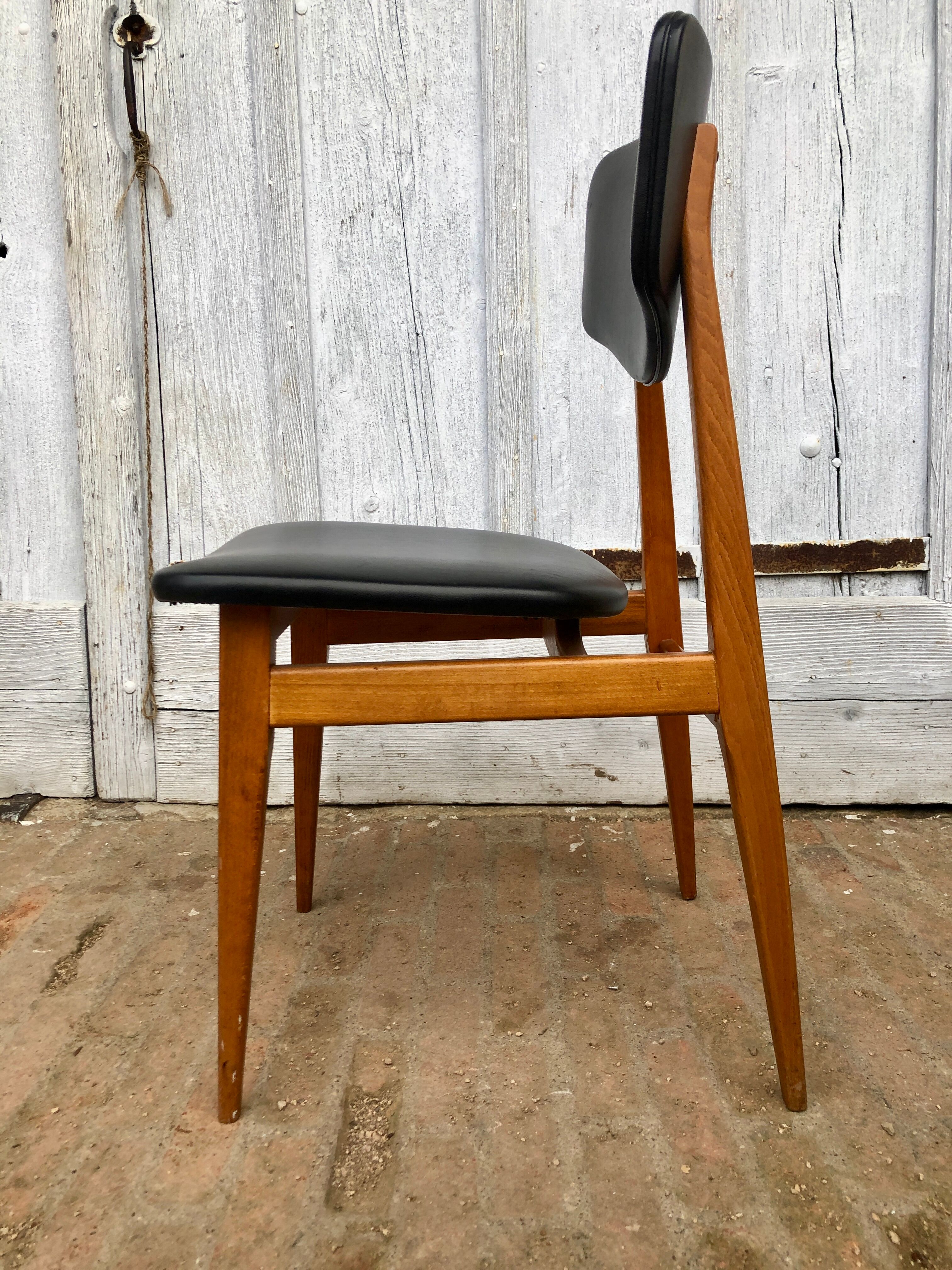 Set of 4 Scandinavian teak and black skai chairs