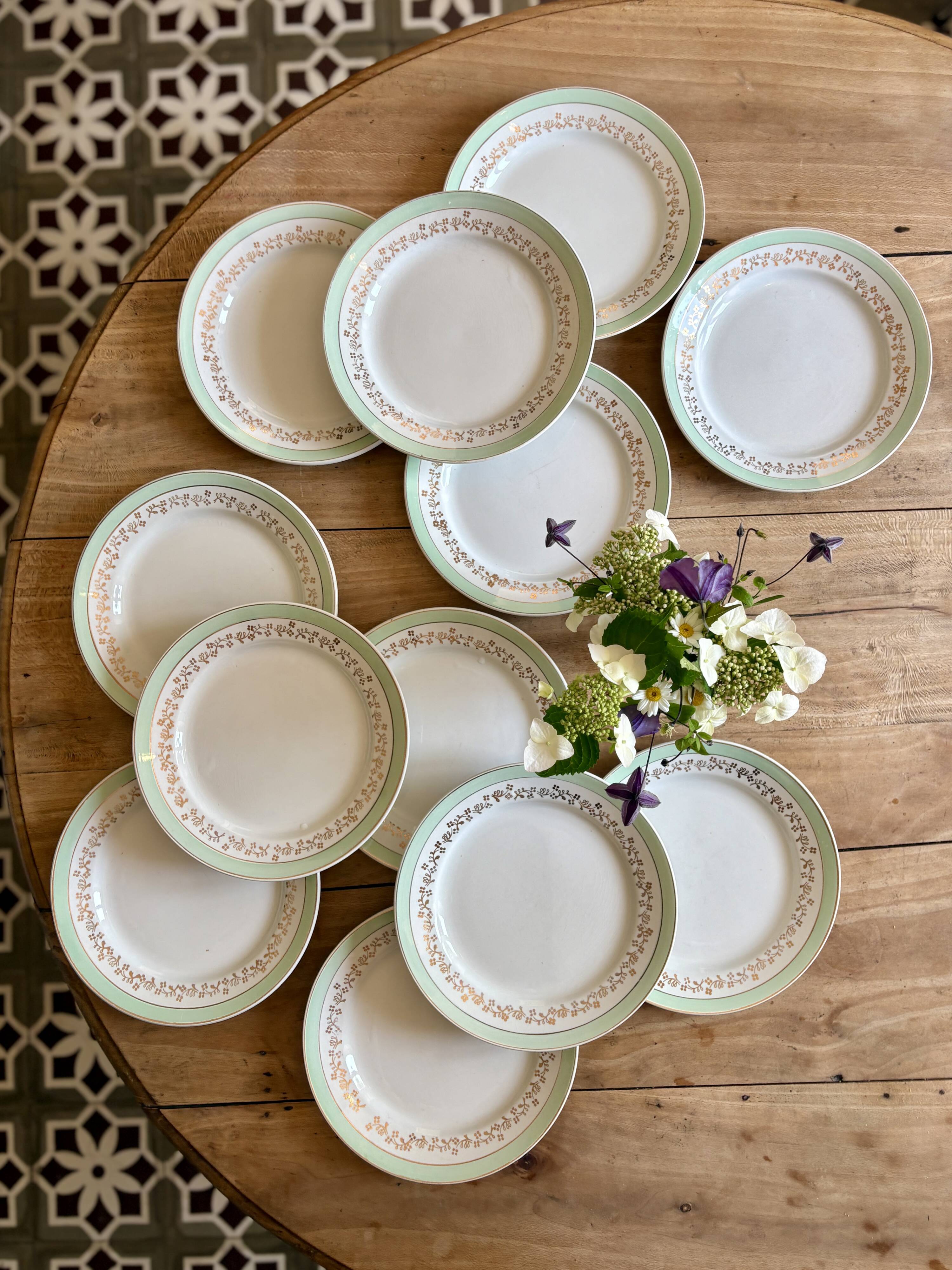 Set of 12 white, mint and gold flat plates, Mosèle de Lunéville