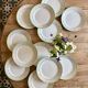 Set of 12 white, mint and gold flat plates, Mosèle de Lunéville