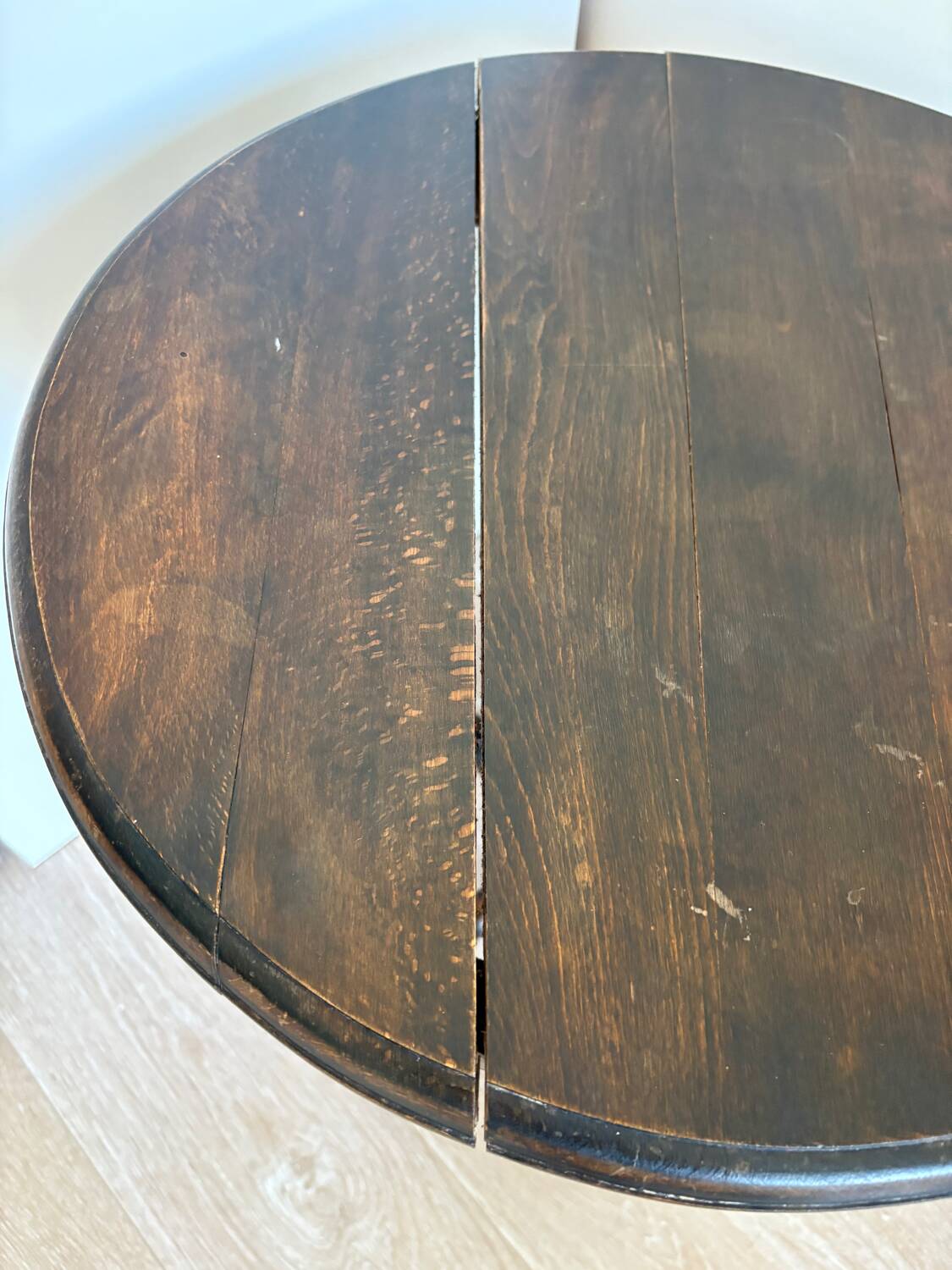 Antique turned wooden side table with authentic charm.