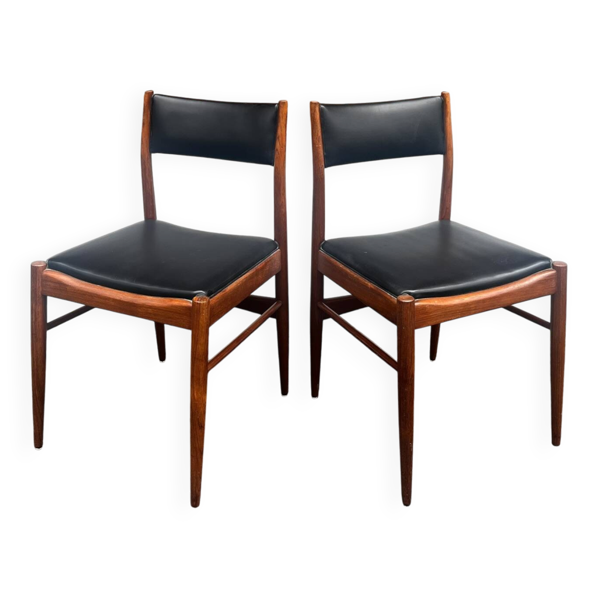 Set of 2 vintage Scandinavian chairs in wood and black faux leather.