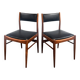 Set of 2 vintage Scandinavian chairs in wood and black faux leather.