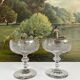 2 antique champagne glasses in engraved glass