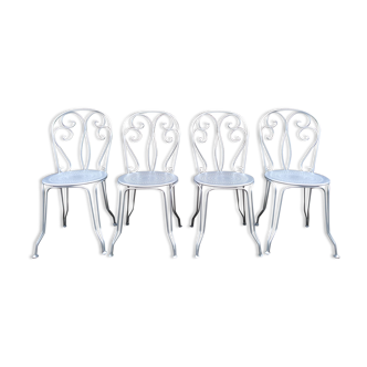 4 vintage wrought iron garden chairs/bistro