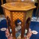 Thuyawood tea table with marquetry decoration.