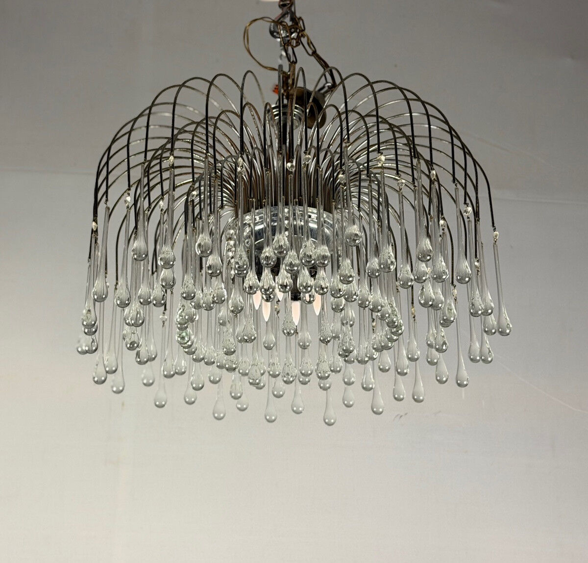 Pair of large chandeliers adorned with glass drops, chrome metal structures, Italy circa 1960.