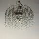 Pair of large chandeliers adorned with glass drops, chrome metal structures, Italy circa 1960.