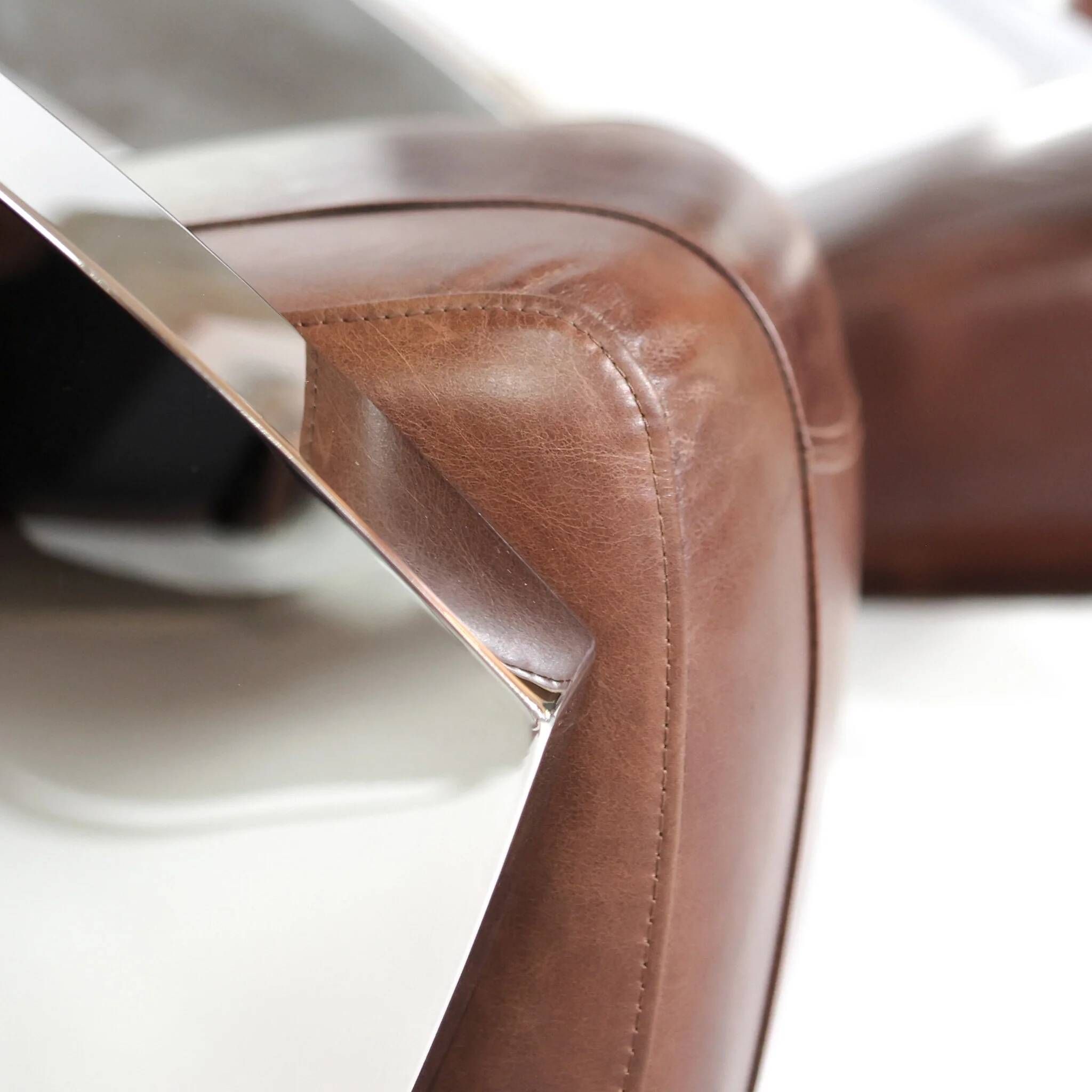 Pair of vintage lounge chairs Demon/Aviator in cognac leather and polished steel, Art Deco style.