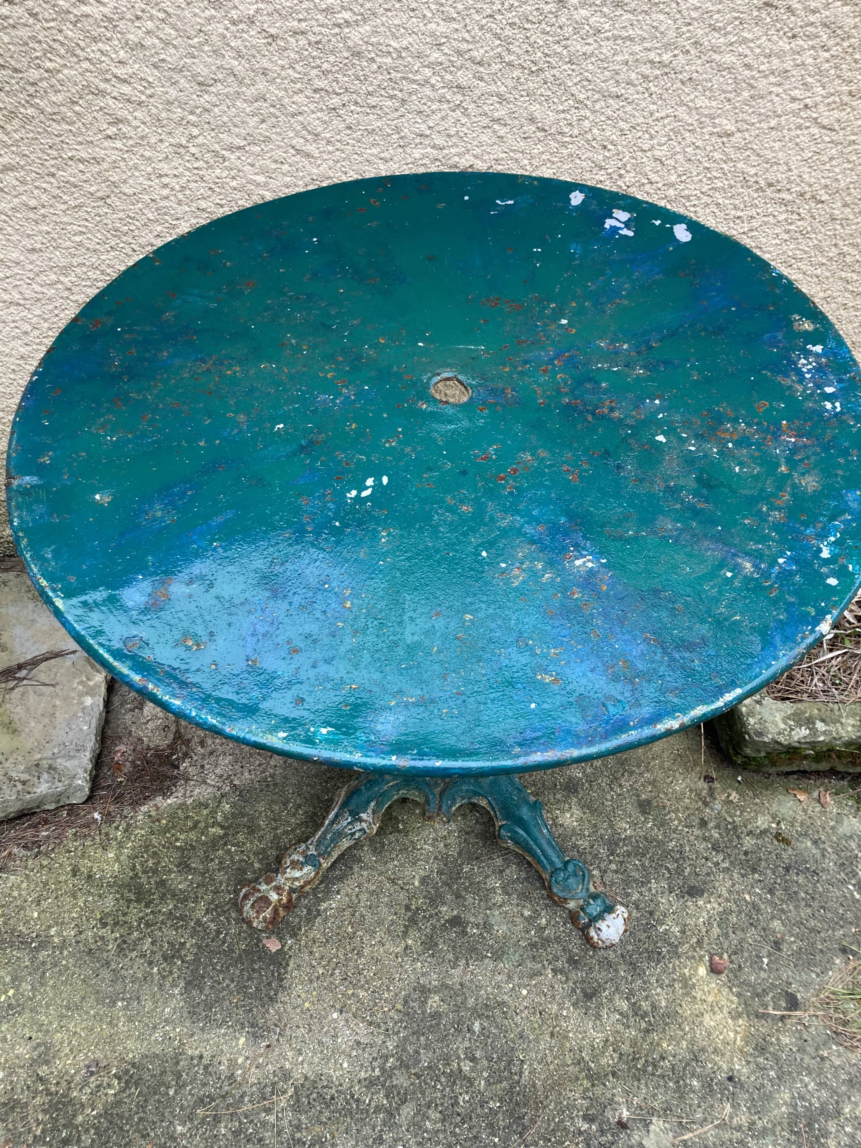 Old wrought iron garden table