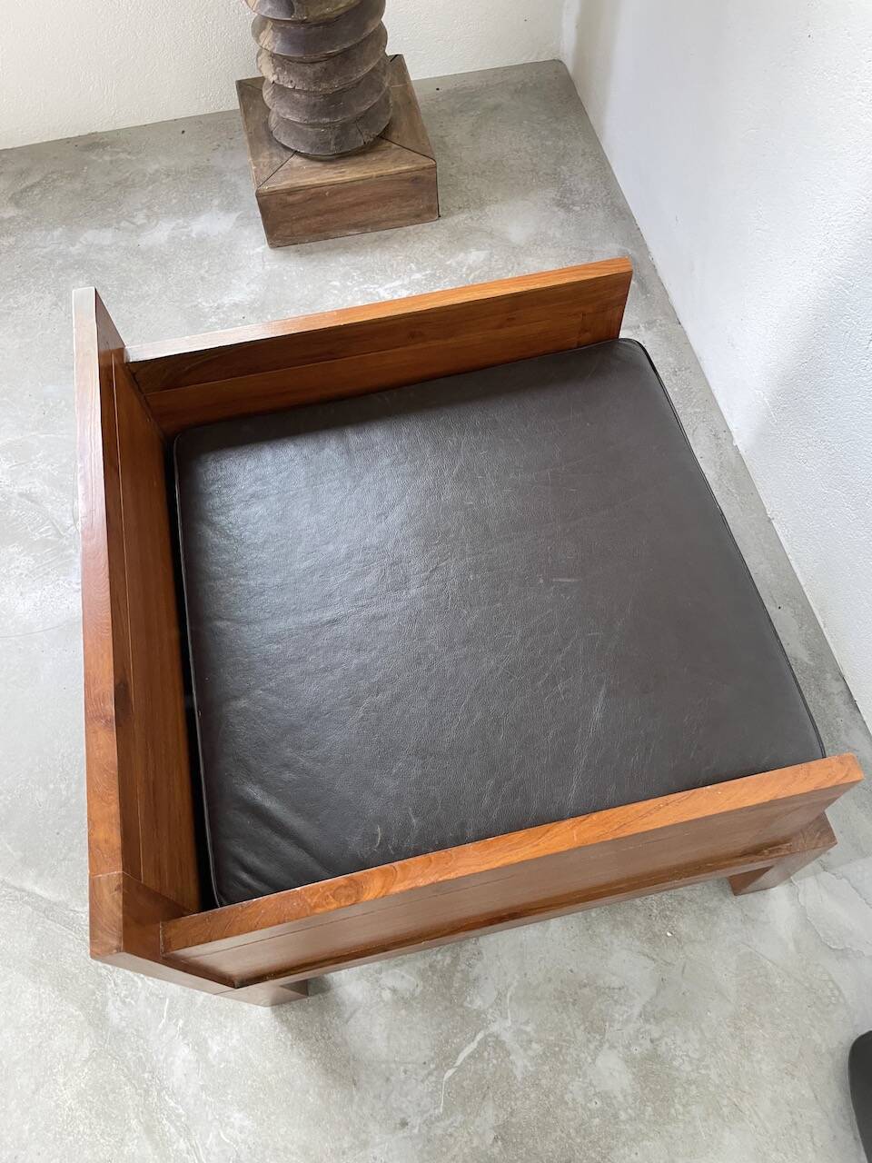 Modernist armchair in exotic wood and leather