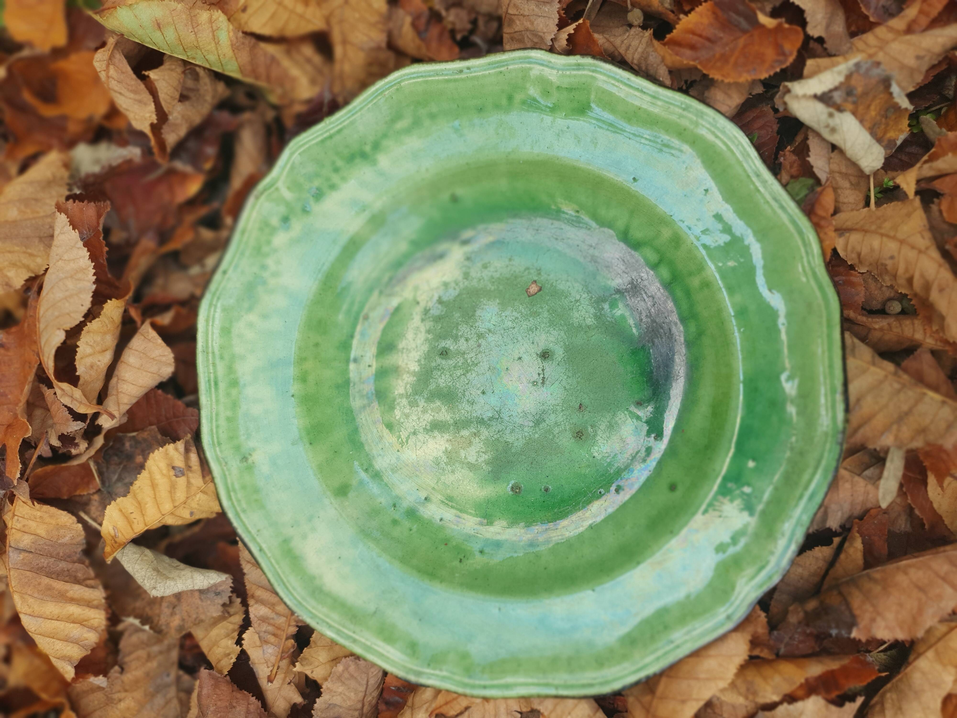 Hollow plate in green glazed clay Etienne Noël