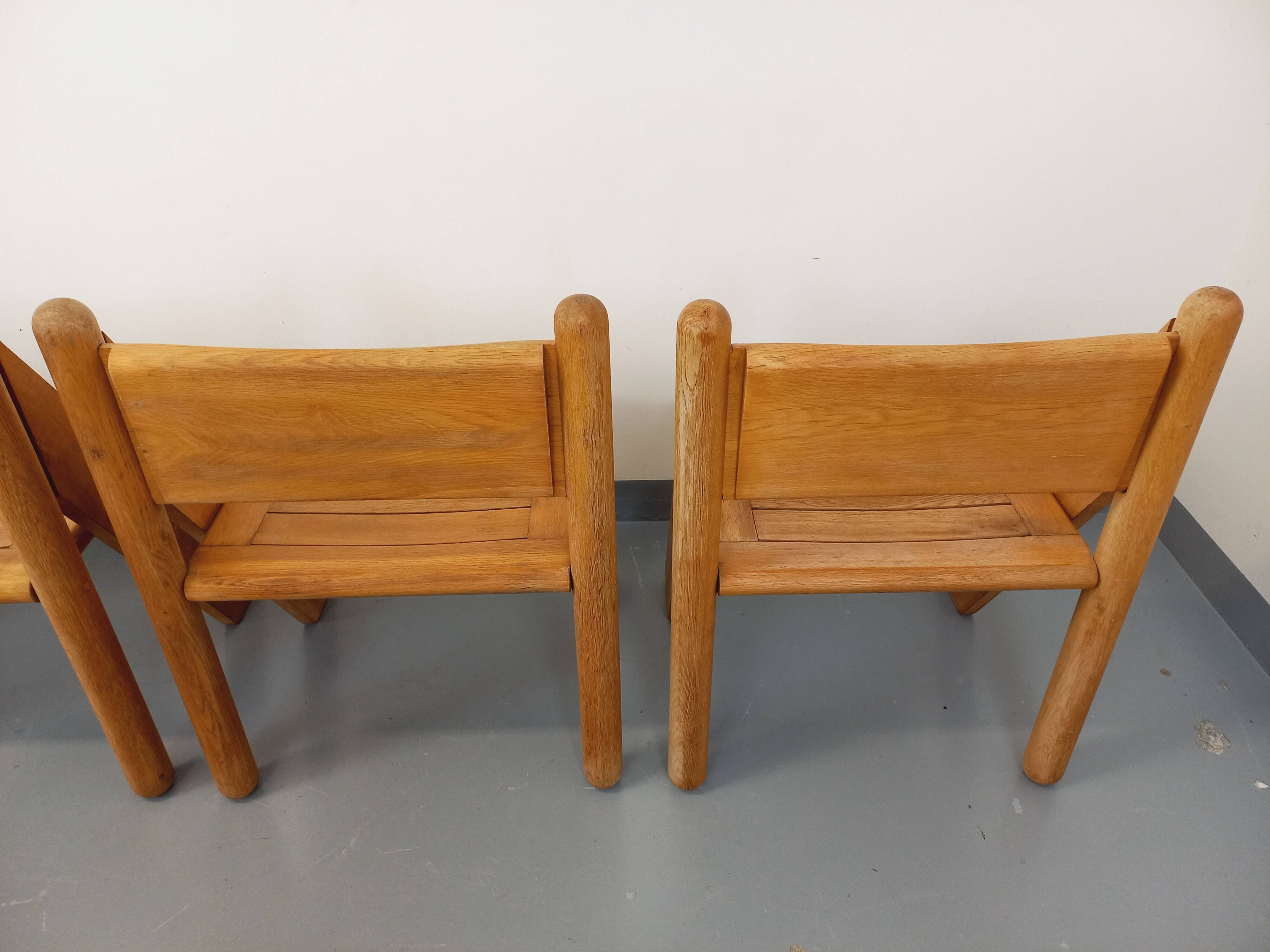 Set of 4 vintage brutalist chairs in solid oak from the 1960s.