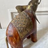 Wooden elephant and brass