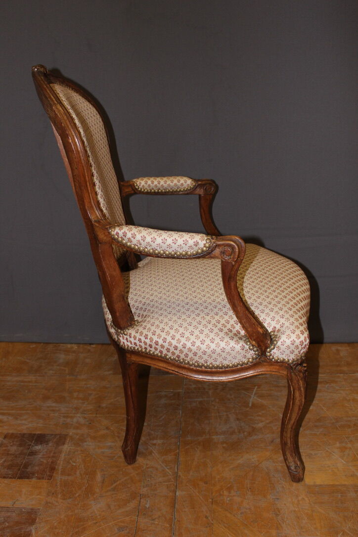 Pair of Louis XV period convertible armchairs