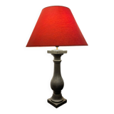 Lamp with red hat and cast iron base