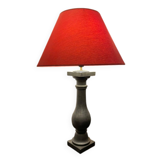 Lamp with red hat and cast iron base