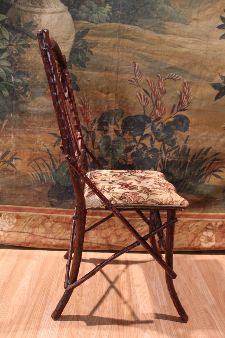 Folk art chair, black forest in branches